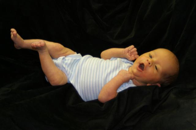 Cheeese! (No, he wasn't really smiling yet -- we just happened to catch him with his mouth open.)