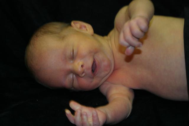 Smiling in his sleep!