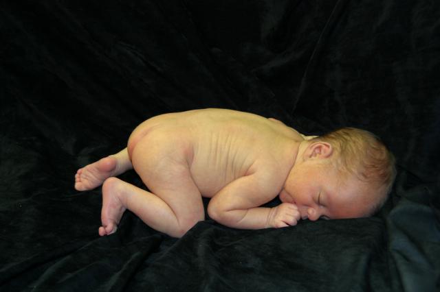 And last but not least, the naked baby! (He wasn't nearly asleep enough for this picture to be as cute as it could have been, but it's still pretty cute!)