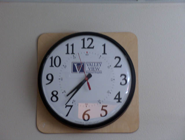 They're taking Abby back to surgery and Jake's taking pictures of the clock. Baby Cantrell was born about 30 minutes later!