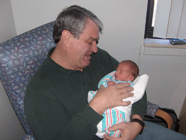 Grandaddy admiring his new grandson