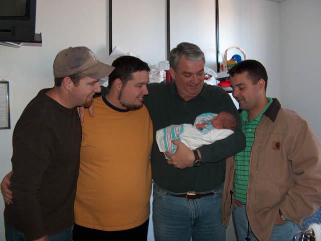 The boys admiring the newest Cantrell boy