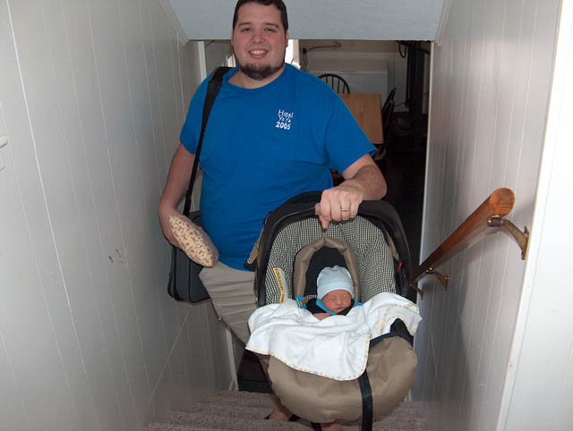 Ty sleeping through his first trip up the stairs