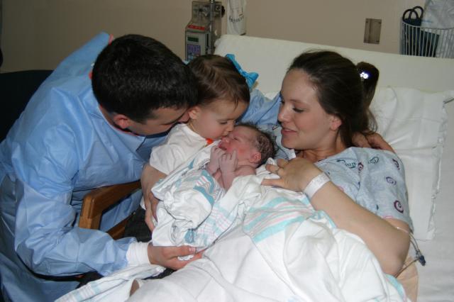 Awww, a big sister kiss!