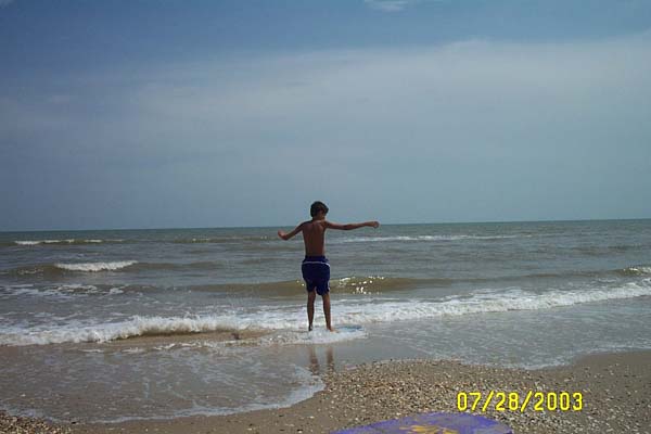 Travis on the Skimboard