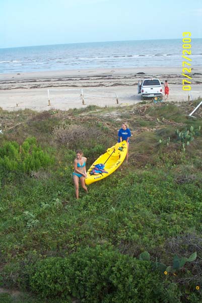 Amber & Michael Carrying a Kayak