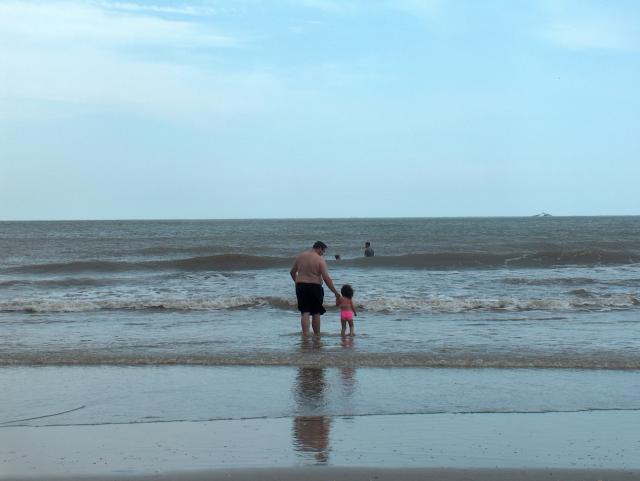 Jake & Ana, heading out into the waves...