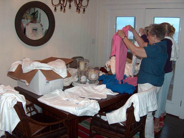 Digging into boxes of Essary Family Reunion shirts