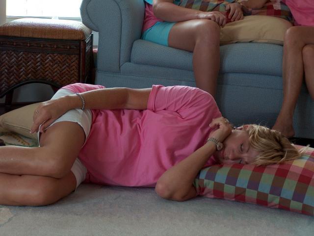 Molly trying to catch a nap on the floor. She didn't have much luck with 4 babies roaming around...