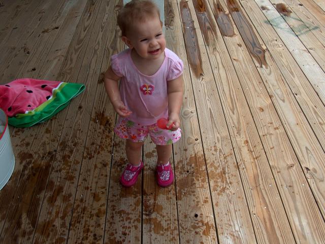 She loved popping the water balloons even more!