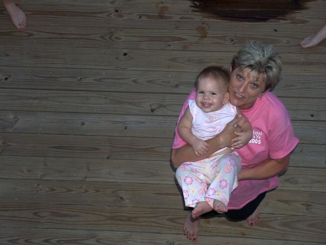 Candy & Charli (looking up at Jake & Abby on the upstairs balcony)
