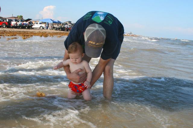 Getting his feet in the water