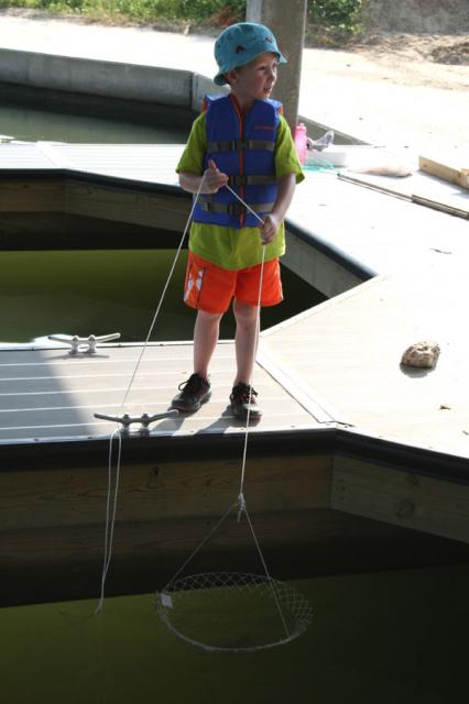 Logan, the only kid who slowly lowered his net down instead of throwing it in