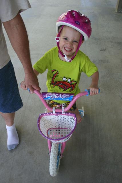 Look, Daddy, a pink bicycle and a pink helmet!