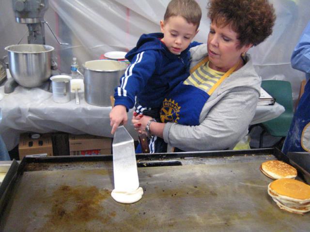 Tyler gets to make a pancake ~ April 1, 2009