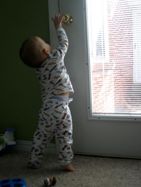 I can reach doorknobs! ~ February 27, 2007