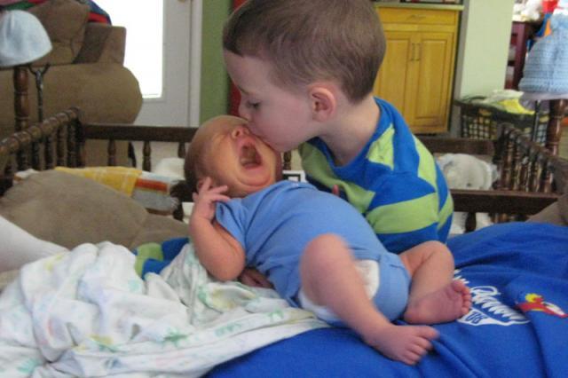 One wants kisses, the other wants milk ~ March 22, 2009