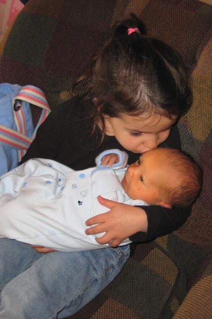 Sweet cousin kisses ~ March 28, 2009