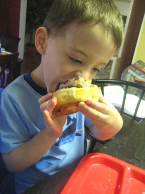 Can you tell the icing is his favorite part? ~ March 8, 2009