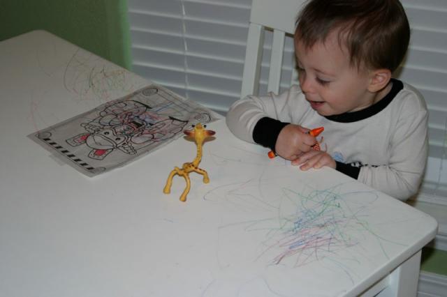 The giraffe is his muse ~ July 7, 2007