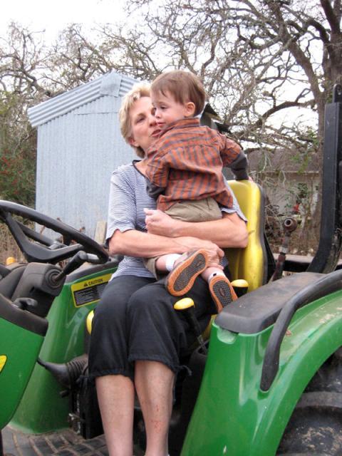 He did finally sit on the tractor with Aunt Di, but he still wasn't too happy about it ~ January 5, 2008