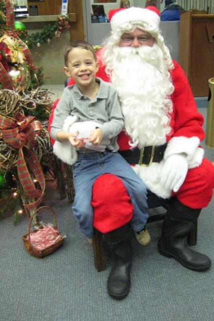 First year Tyler's sat for a picture with Santa since the year he was two weeks old! ~ December 24, 2009