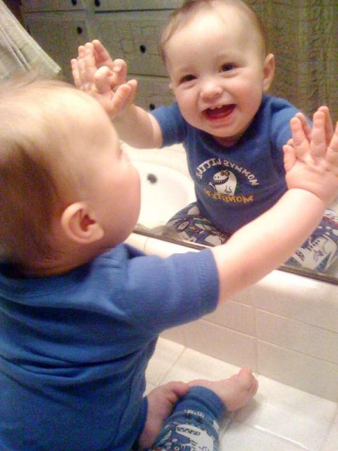 Baby in the mirror ~ December 15, 2009