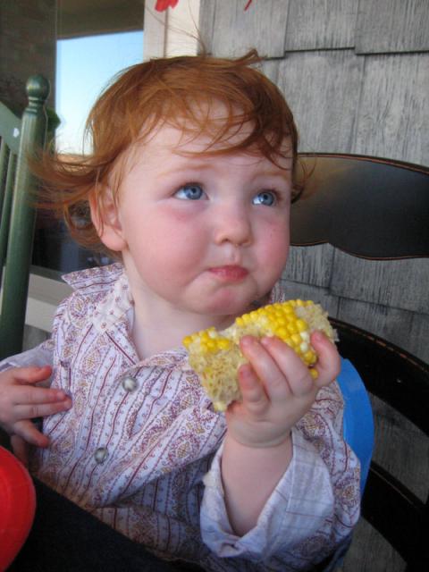 Miss Elyn and her favorite, corn on the cob!