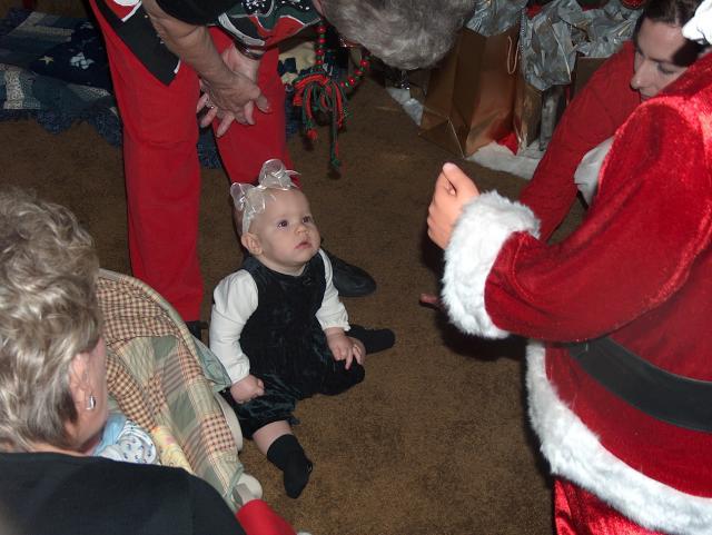 Charli checking out Santa