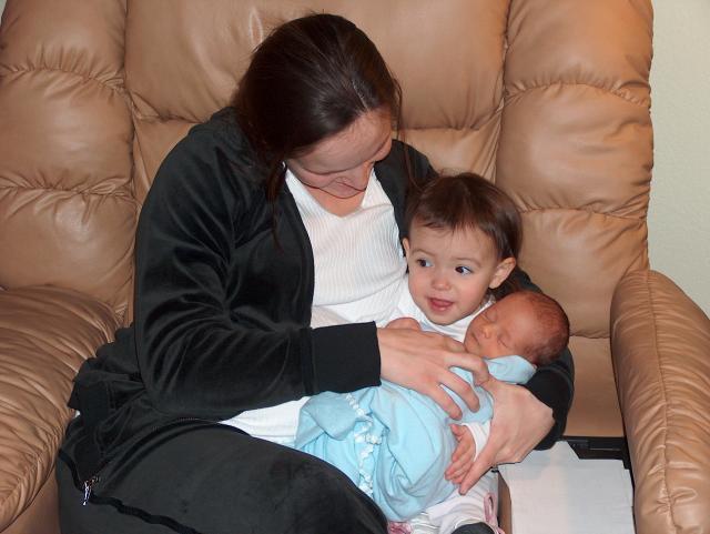 Gracie gets to hold her new cousin