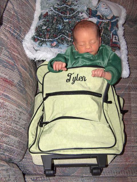 Tyler loves his new backpack from Aunt Molly!