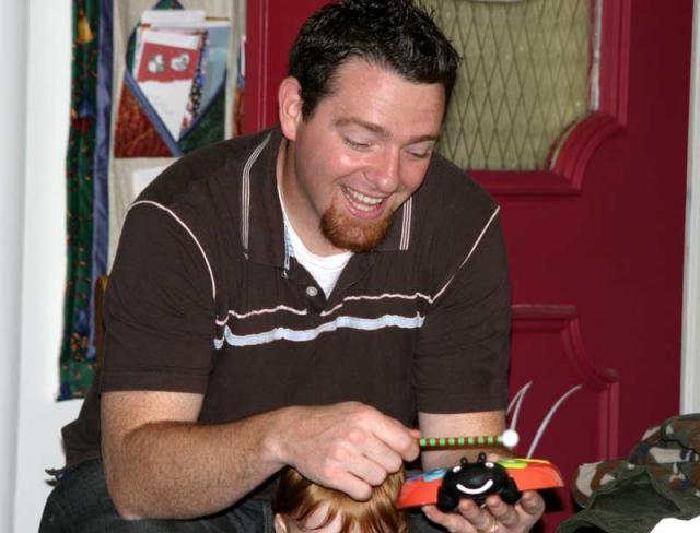 Kyle's a natural on the ladybug xylophone!
