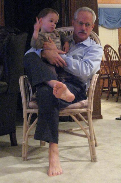 Telling the puppy to "Sit!"