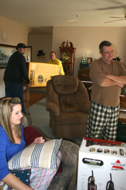 Making Papa turn around while the boys bring in his big present