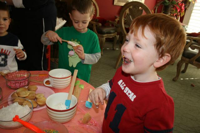 Toren had to test out the sprinkes -- by sticking his tongue in the bowl!