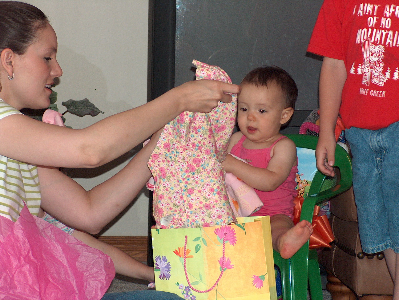 Ohhh, a pretty new dress (from Uncle Jake & Aunt Abby -- we're pretty sure it was Gracie's favorite!)