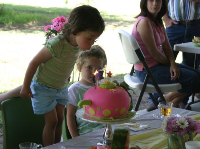 Making her birthday wish! (She told her mom that she wished for a nap.)