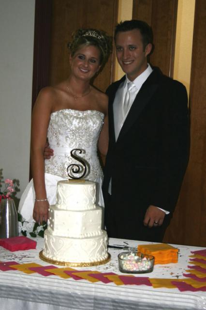 Happy couple and cake