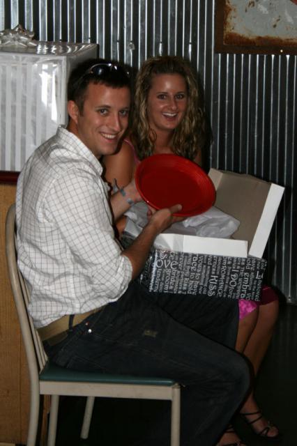 Opening a few early presents at the rehearsal dinner