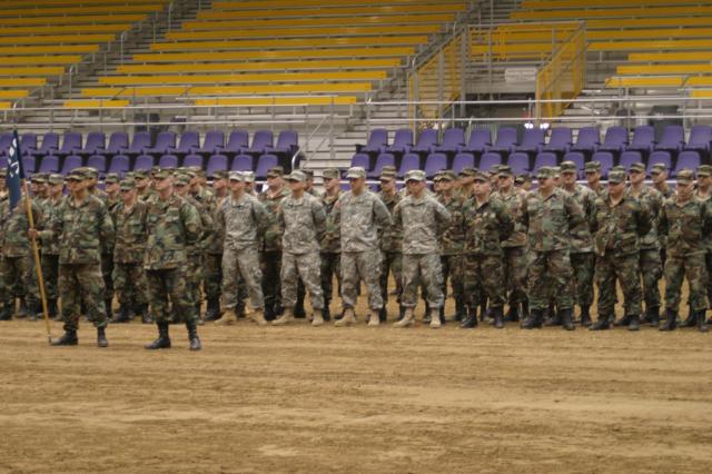 John is the 3rd from the left in the lighter (newer) uniforms
