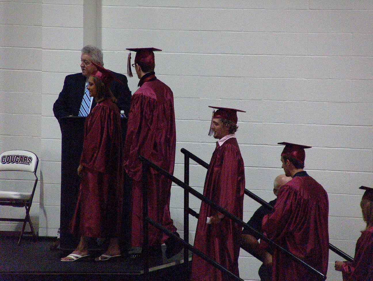 Lined up to walk across the stage...