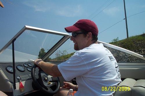 Kyle Driving the Boat