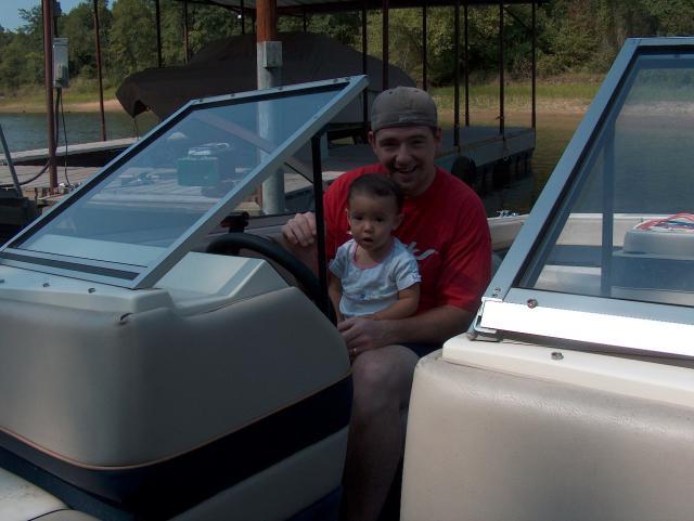 Gracie & Uncle Kyle "driving" the boat