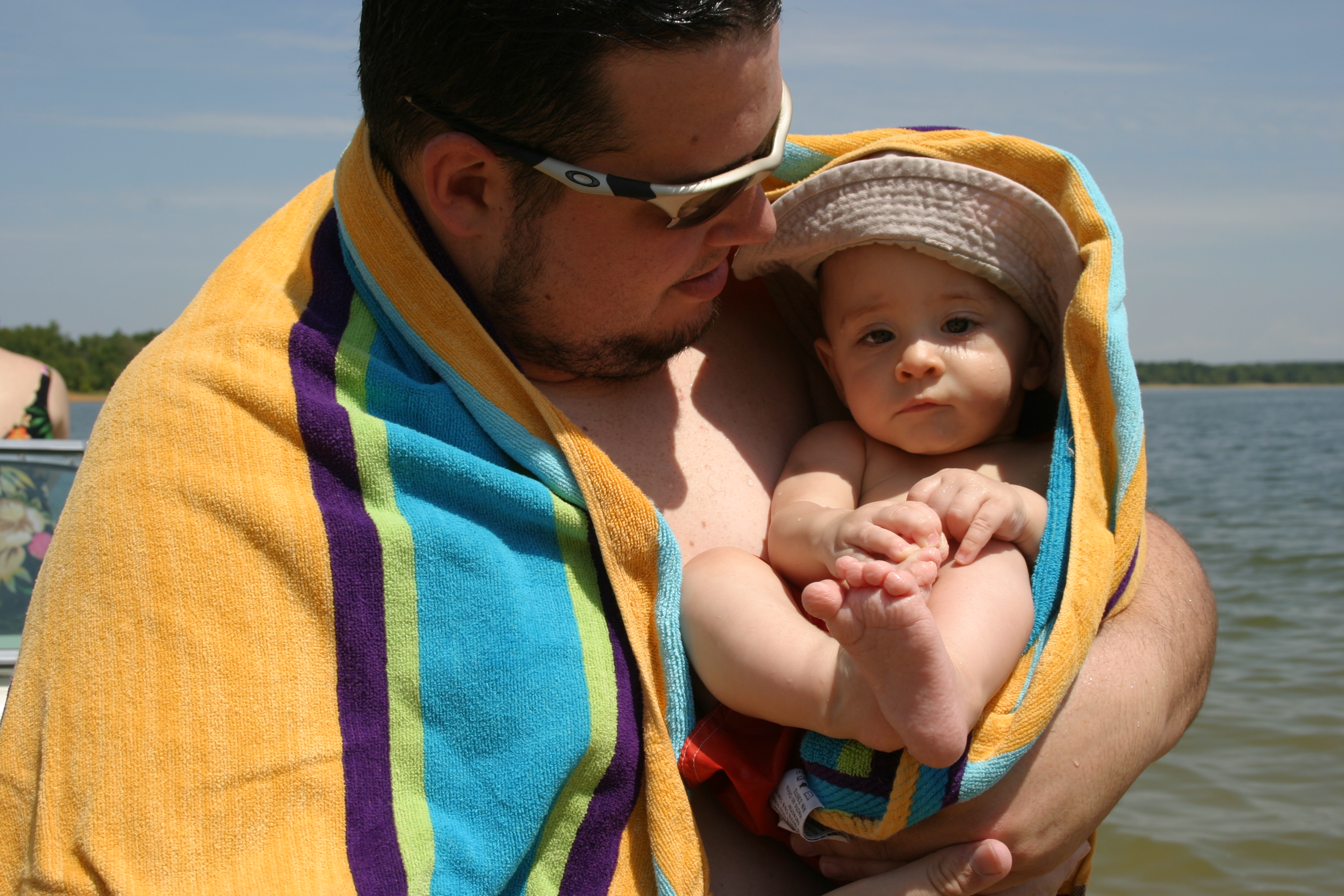 Sleepy boy in a towel
