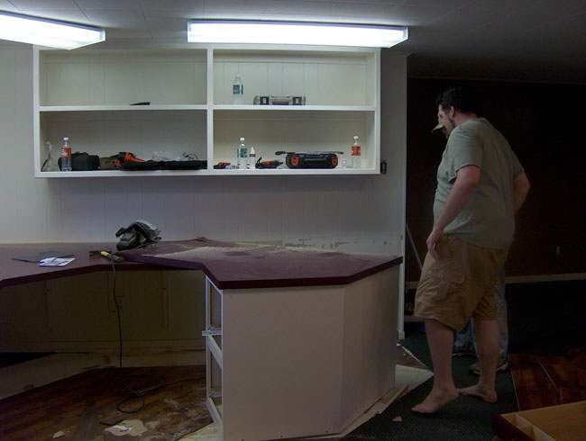 Hmmm... (the desk isn't coming out as easily as they'd hoped)