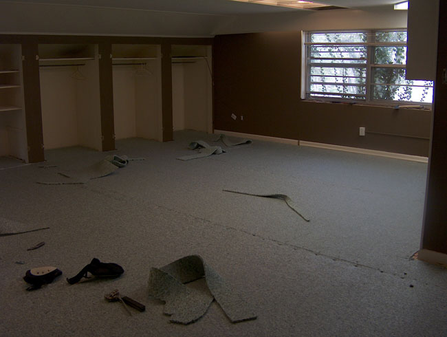 The carpet pad goes down...