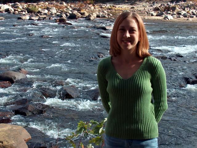 Abby in Front of the Scenic River View