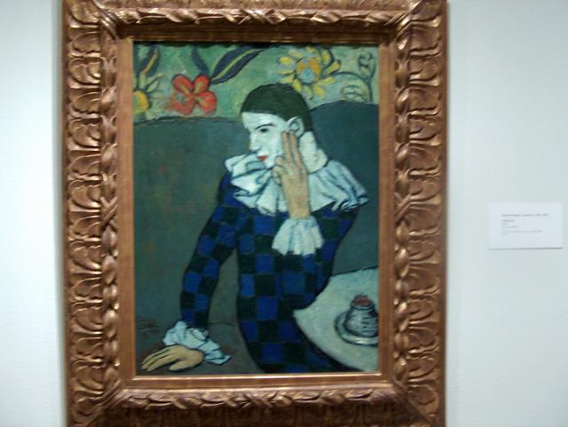 Harlequin by Pablo Picasso