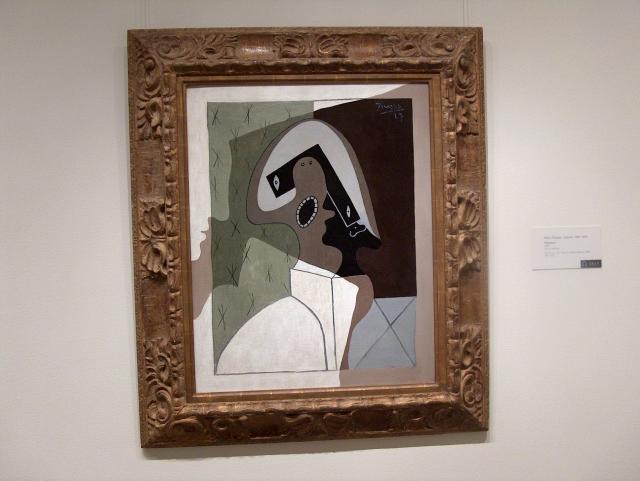 Harlequin by Pablo Picasso