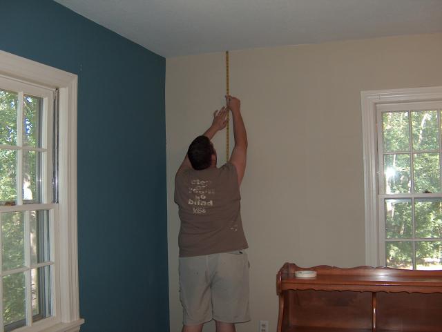 The measuring before the painting